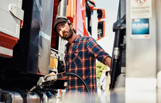 Man fueling his truck